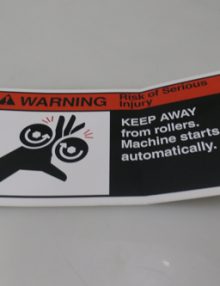 30024106 - DECAL WARNING KEEP AWAY FROM ROLLERS -MACHINE STARTS AUTOMATICALLY