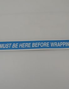 30032877 - LABEL 'CLAMP MUST BE HERE BEFORE WRAPPING. FOR Q SEMIAUTOMATIC XT'