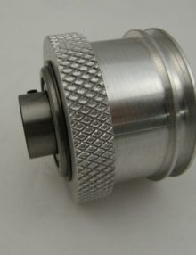 30076897 - WHEEL KNURLED UPPER DISCHARGE W/ BEARINGS SIDE SEALER