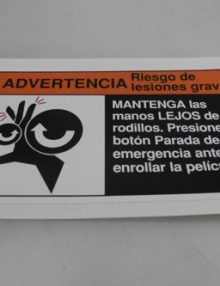 30116684 - LABEL WARNING 'KEEP AWAY FROM ROLLERS' (SIZE = 5.67 X 3.0) - SPANISH (ENG EQUIV 30116683)
