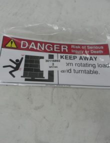 30116892 - LABEL REGULATORY ANSI DANGER 'KEEP AWAY FROM ROTATING LOAD AND TURNTABLE' (SIZE = 6.63 X 3.00)